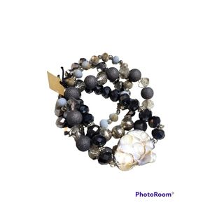 Beautiful faux pearl Bracelet.  Dark tones. Stretchy costume jewelry.